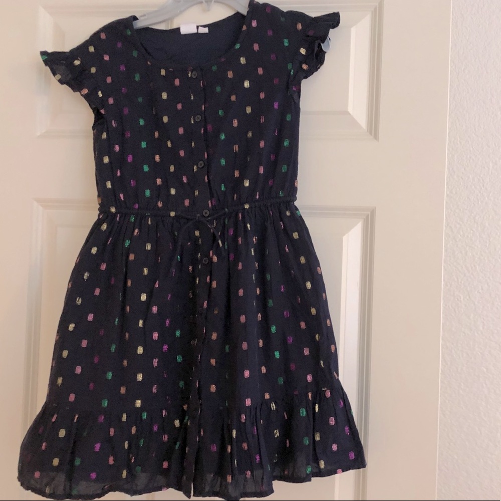 Navy blue girl’s dress with metallic polka dots